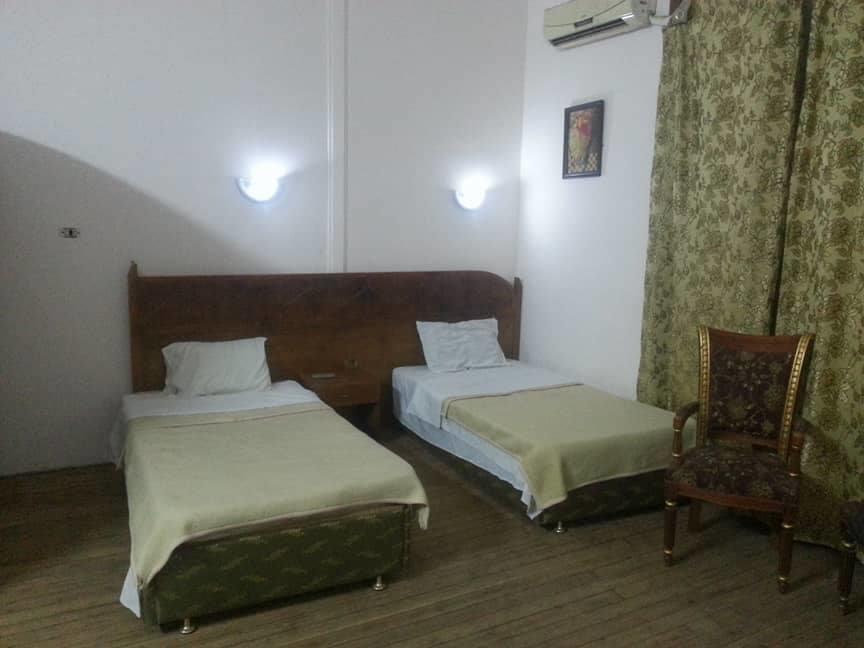 Louris Inn Hotel Caïro Buitenkant foto